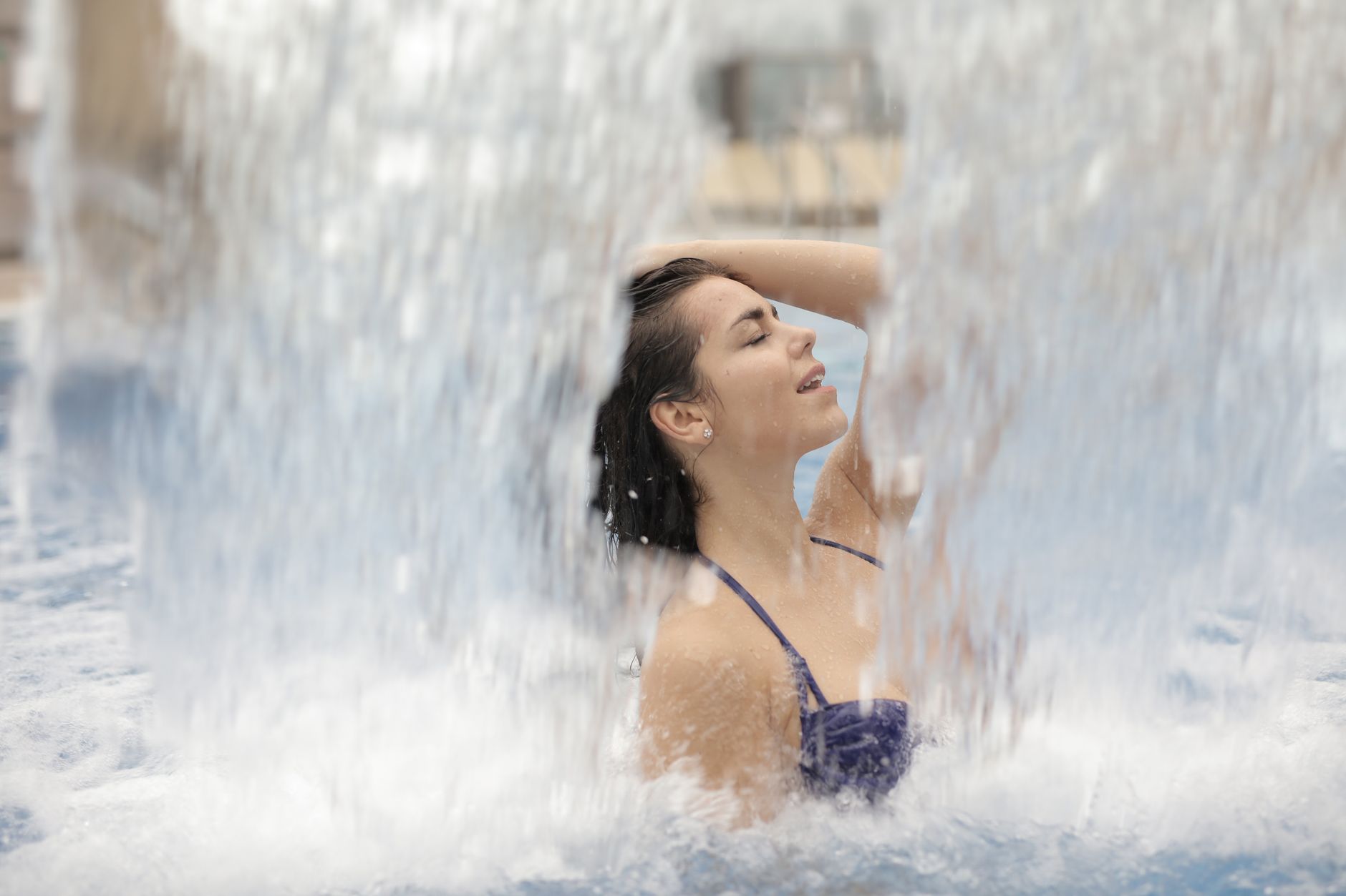 Woman in a bikini by the water