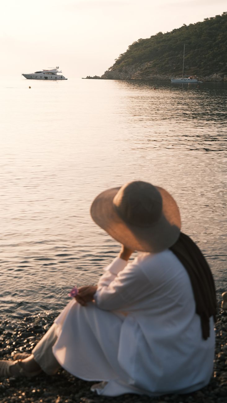 Woman in a bikini by the water
